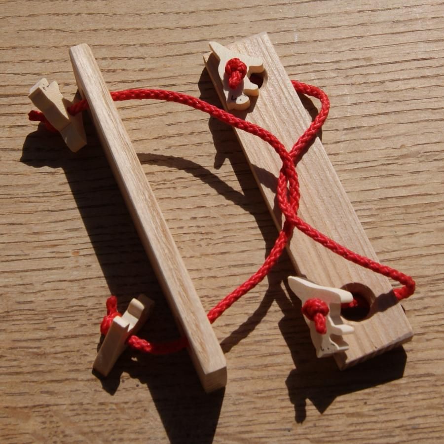 Woodchuck Puzzle Wood and String Puzzle