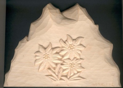 Mountain with hand carved edelweiss