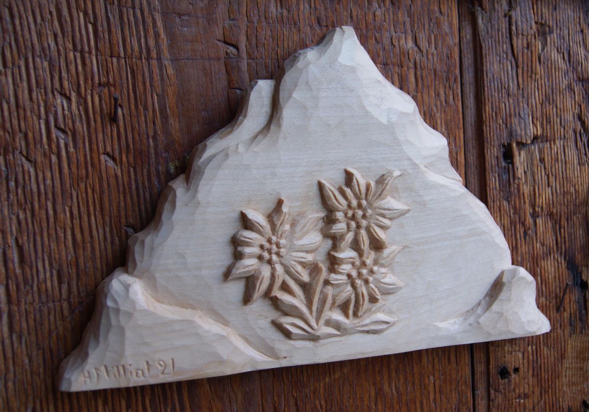 Mountain with hand carved edelweiss