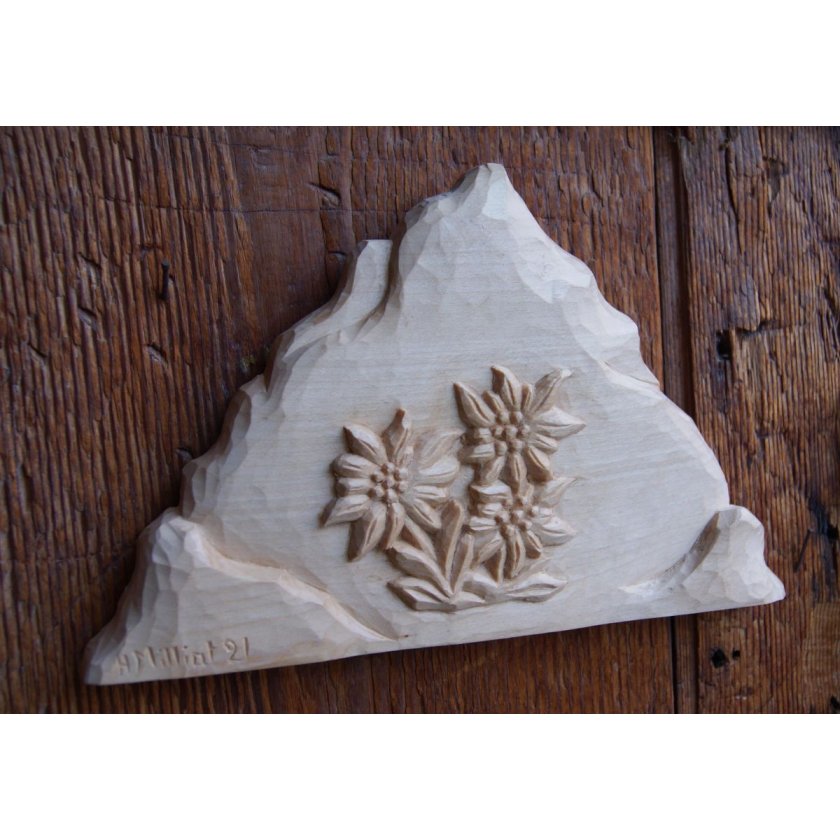 Mountain with hand carved edelweiss