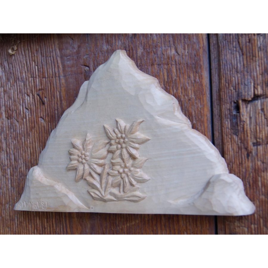 Mountain with hand carved edelweiss