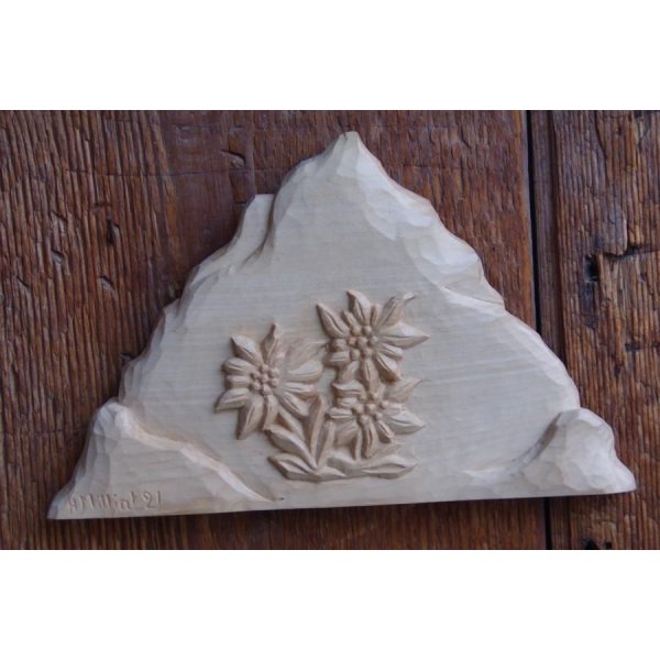 Mountain with hand carved edelweiss