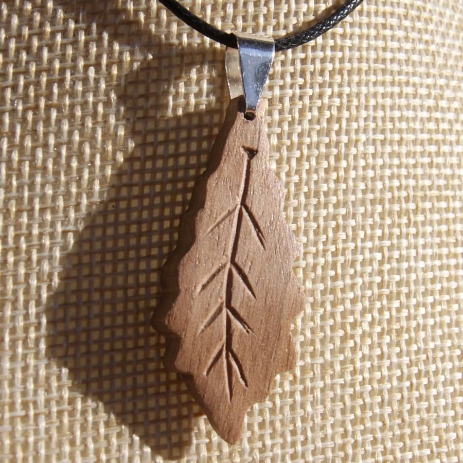 oak leaf pendant made of waxed walnut wood ethical jewel, handmade