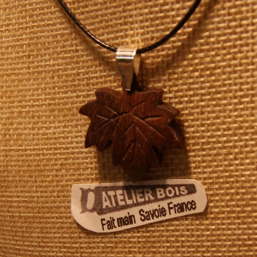 maple leaf pendant in walnut wood waxed ribbed ethical jewelry, handmade