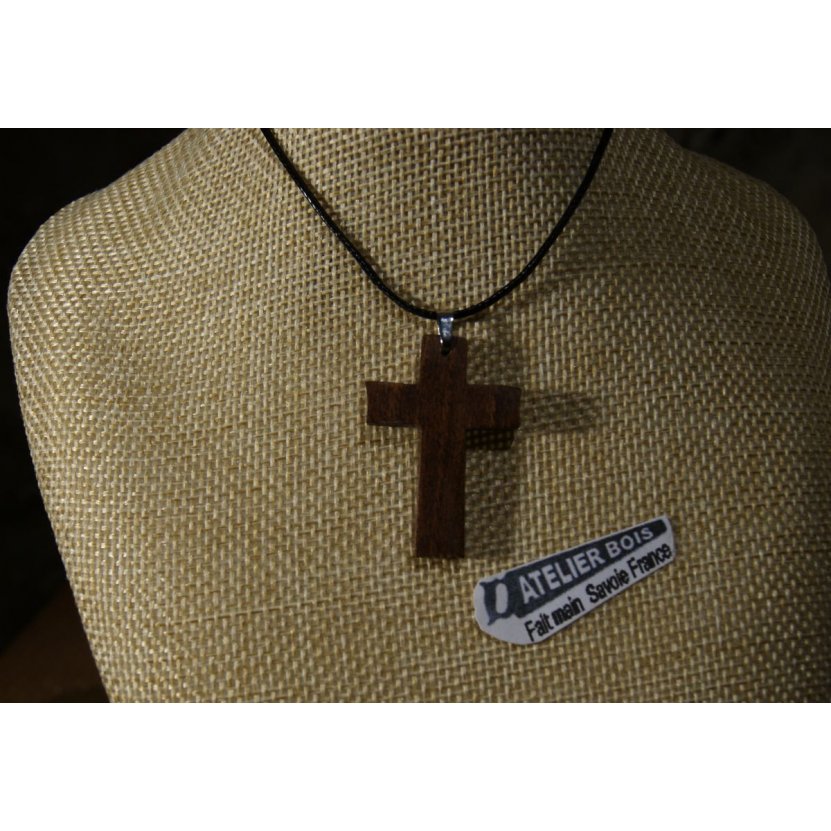 small cross pendant made of solid walnut wood