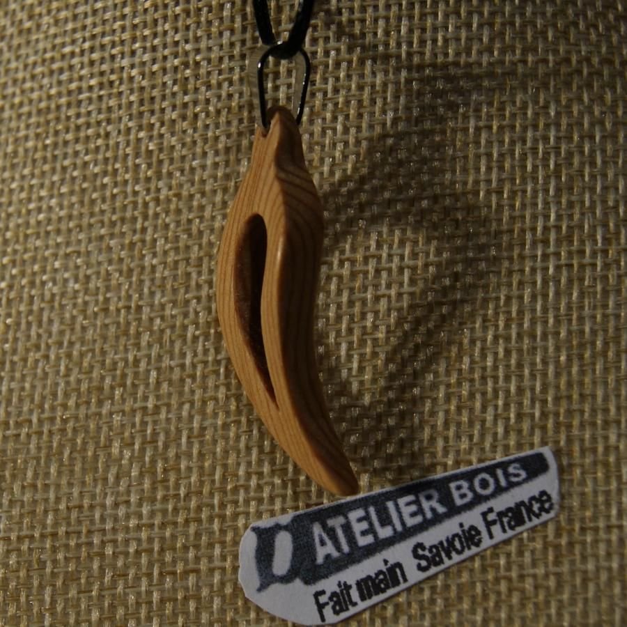 pendant feather or curved leaf made of waxed meleze wood handmade ethical jewelry nature