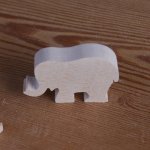 Miniature elephant figurine in solid wood to decorate handmade crafts 