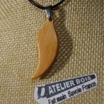wooden pendant feather or leaf made of waxed larch wood, handmade ethical jewel