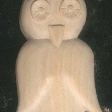 Unwaxed carved owl