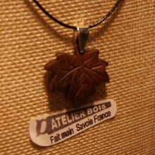 maple leaf pendant in walnut wood waxed ribbed ethical jewelry, handmade