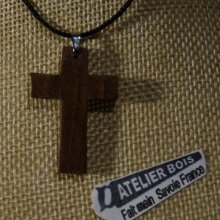small cross pendant made of solid walnut wood